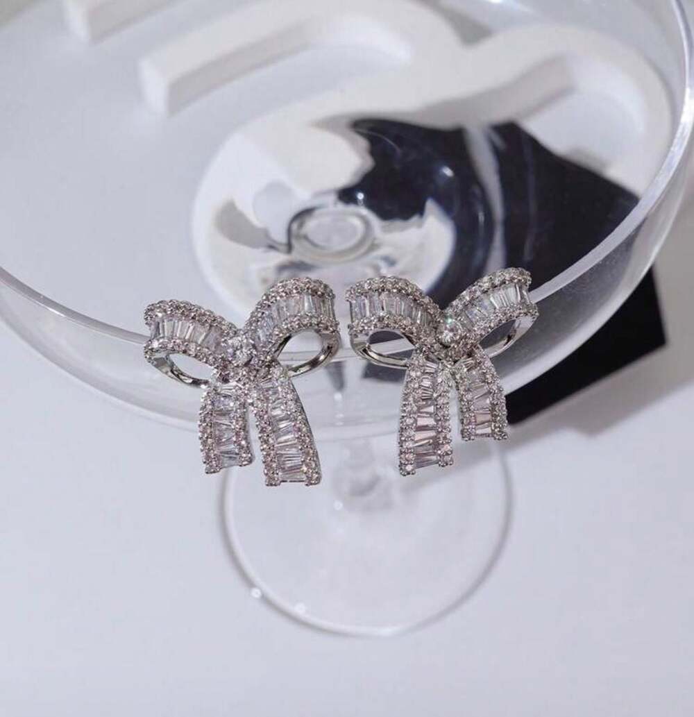 Glamorous Cubic Zirconia Encrusted Bow Design Stud Earrings
